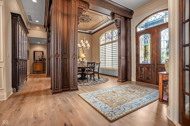 3075 Hurricane Rd, Franklin, IN 46131 - foyer featuring a chandelier, light wood-style flooring, ornamental molding, and recessed lighting