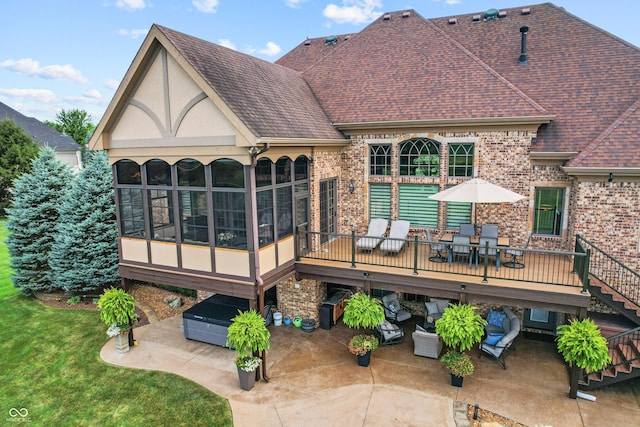 3075 Hurricane Rd, Franklin, IN 46131 - rear view of property featuring a patio, a sunroom, a shingled roof, and outdoor dining space