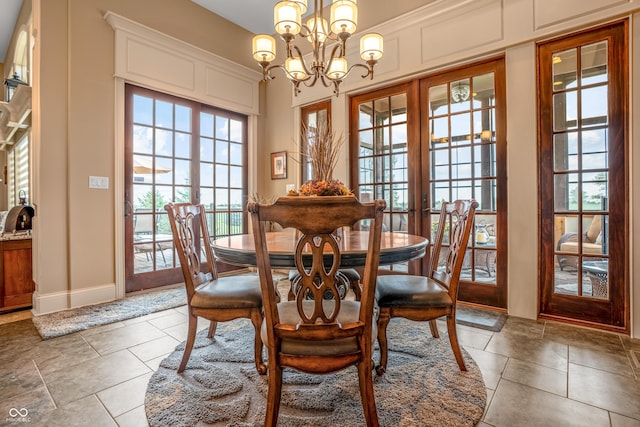 3075 Hurricane Rd, Franklin, IN 46131 - dining area featuring french doors and a chandelier