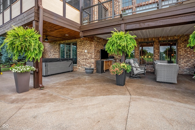 3075 Hurricane Rd, Franklin, IN 46131 - patio / terrace with a hot tub, a patio area, and a ceiling fan