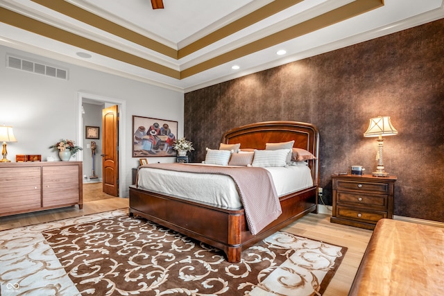 3075 Hurricane Rd, Franklin, IN 46131 - bedroom with wood finished floors, crown molding, recessed lighting, and a raised ceiling
