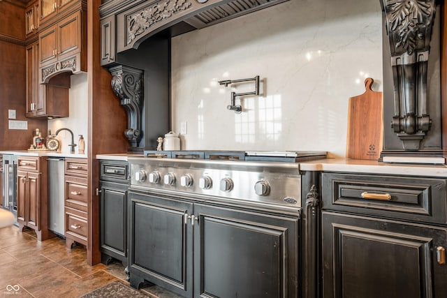 3075 Hurricane Rd, Franklin, IN 46131 - kitchen with light countertops, stainless steel gas cooktop, and glass insert cabinets