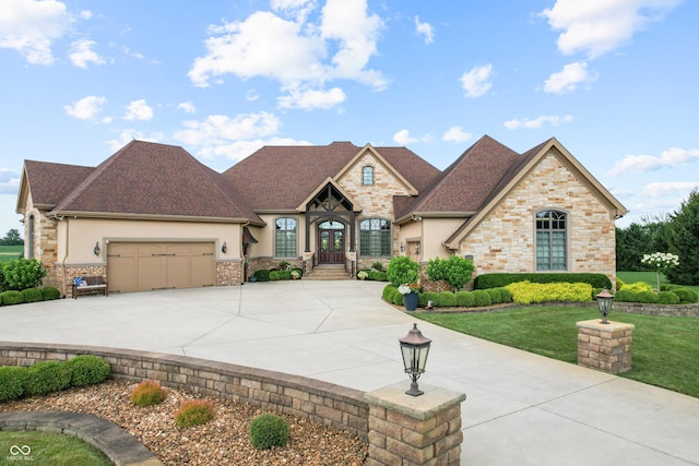 3075 Hurricane Rd, Franklin, IN 46131 - french provincial home featuring french doors, driveway, stucco siding, and an attached garage