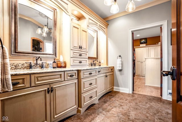 3075 Hurricane Rd, Franklin, IN 46131 - bathroom featuring double vanity and a chandelier