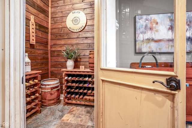 3075 Hurricane Rd, Franklin, IN 46131 - wine cellar with wood walls and stone finish flooring