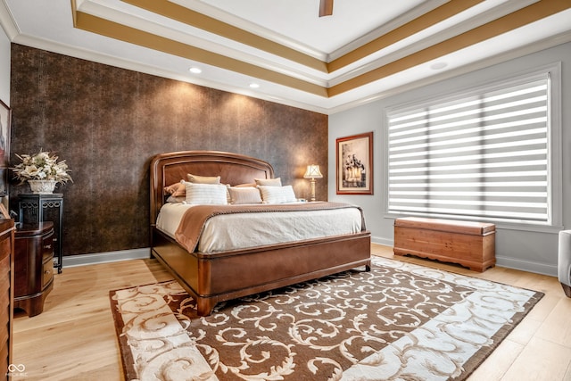 3075 Hurricane Rd, Franklin, IN 46131 - bedroom featuring a tray ceiling, ornamental molding, wood finished floors, a ceiling fan, and recessed lighting