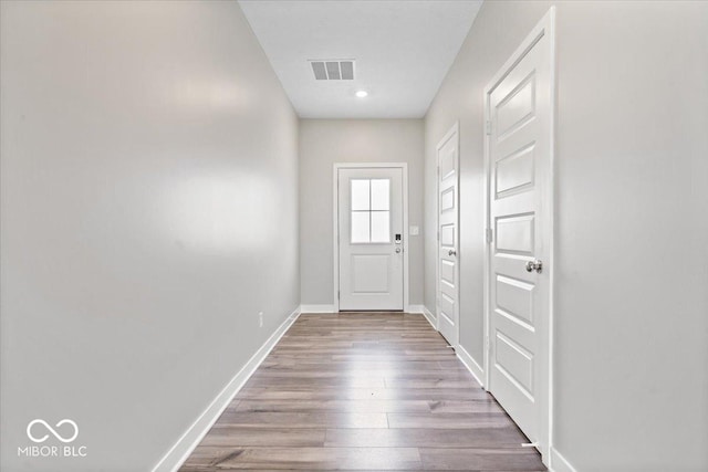 11431 Hartwell St, Indianapolis, IN 46235 - doorway with wood finished floors and recessed lighting