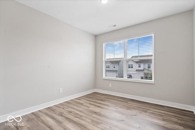 11431 Hartwell St, Indianapolis, IN 46235 - empty room featuring baseboards and wood finished floors