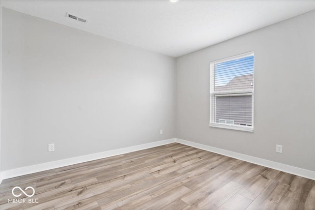 11431 Hartwell St, Indianapolis, IN 46235 - spare room featuring wood finished floors and baseboards