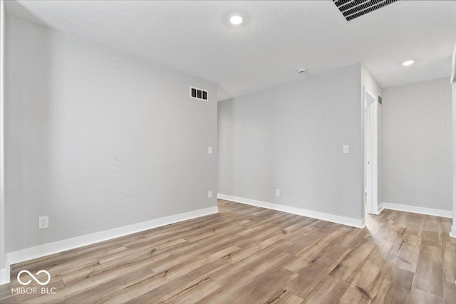 11431 Hartwell St, Indianapolis, IN 46235 - spare room with light wood-style floors and recessed lighting