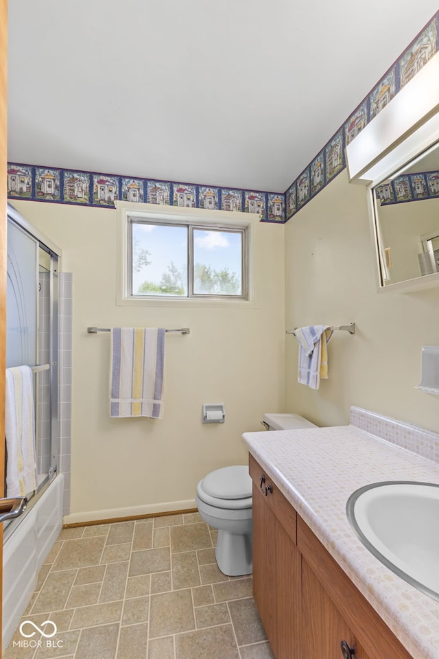 2752 Vinewood Dr, Speedway, IN 46224 - full bathroom with vanity and bath / shower combo with glass door