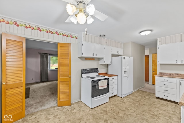 2752 Vinewood Dr, Speedway, IN 46224 - kitchen with white appliances, light floors, ceiling fan, and white cabinets