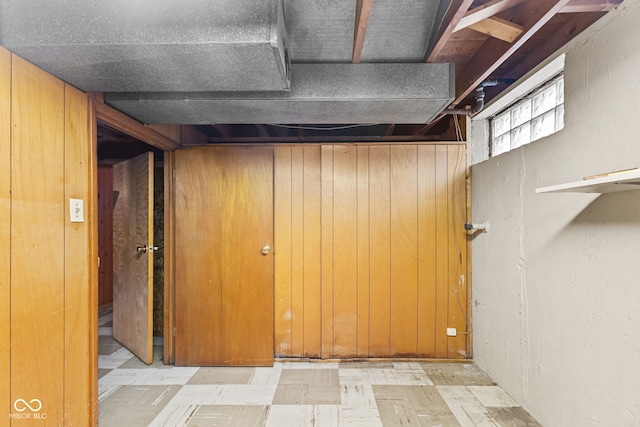 2752 Vinewood Dr, Speedway, IN 46224 - below grade area featuring tile patterned floors and wood walls