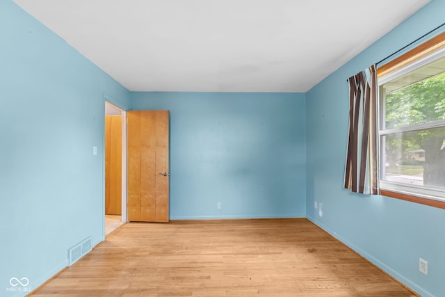 2752 Vinewood Dr, Speedway, IN 46224 - empty room featuring wood finished floors and baseboards