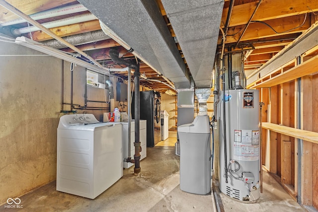 2752 Vinewood Dr, Speedway, IN 46224 - unfinished below grade area with gas water heater, black fridge with ice dispenser, a water softener, and washer and clothes dryer