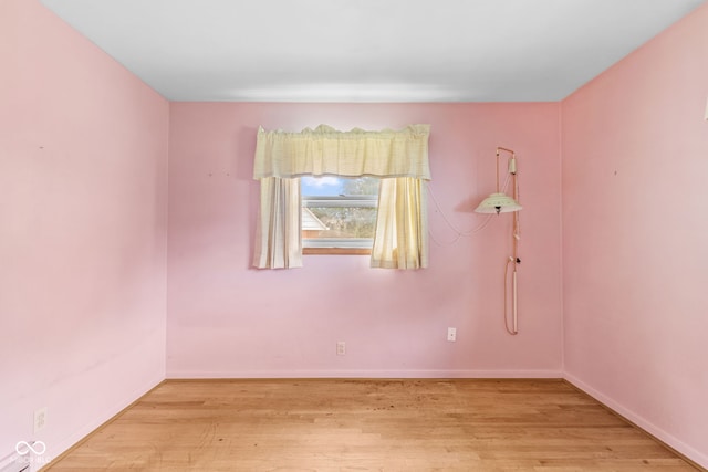 2752 Vinewood Dr, Speedway, IN 46224 - spare room featuring light wood-type flooring and baseboards