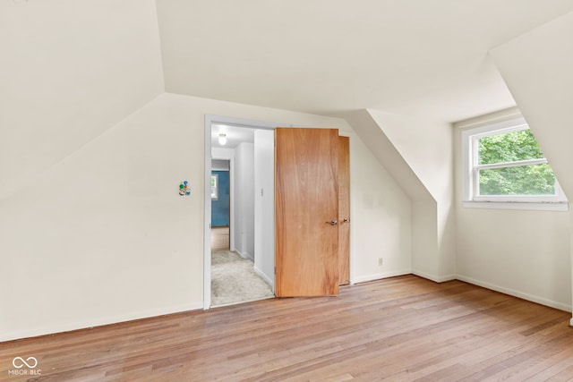 2752 Vinewood Dr, Speedway, IN 46224 - additional living space featuring light wood-type flooring and lofted ceiling