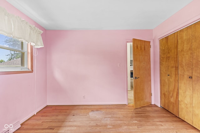 2752 Vinewood Dr, Speedway, IN 46224 - unfurnished bedroom with light wood-style floors and a closet