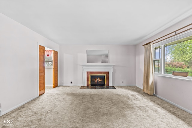 2752 Vinewood Dr, Speedway, IN 46224 - unfurnished living room featuring a fireplace and carpet flooring