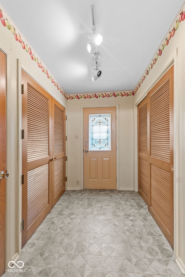 2752 Vinewood Dr, Speedway, IN 46224 - foyer entrance featuring baseboards