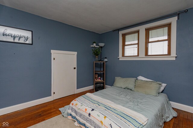 4729 W 100 N, Wolcott, IN 47995 - bedroom featuring hardwood / wood-style floors and baseboards
