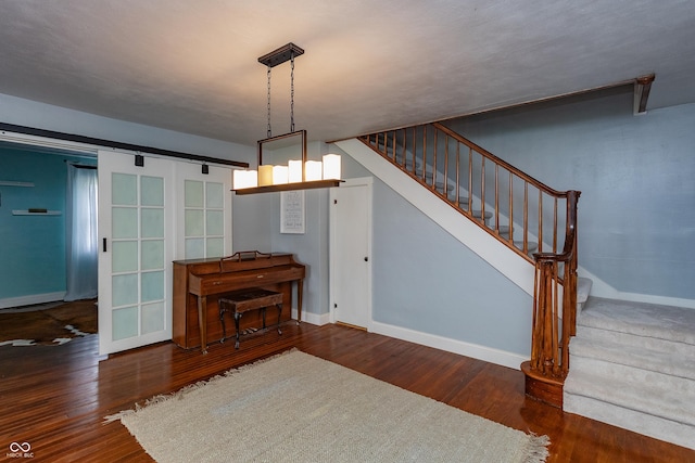 4729 W 100 N, Wolcott, IN 47995 - stairs featuring baseboards and wood finished floors