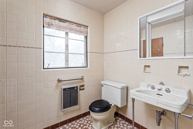 5519 N County Rd 550 E, Pittsboro, IN 46167 - half bathroom featuring heating unit and tile walls