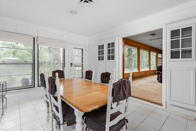 5519 N County Rd 550 E, Pittsboro, IN 46167 - dining area featuring crown molding, healthy amount of natural light, and light tile patterned floors