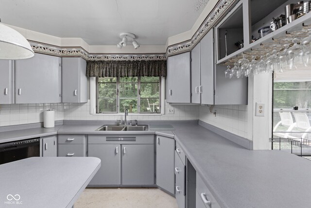 5519 N County Rd 550 E, Pittsboro, IN 46167 - kitchen with gray cabinets, decorative backsplash, light countertops, and dishwasher