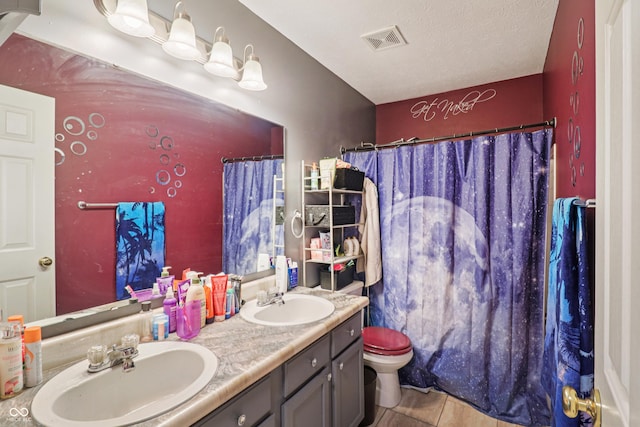 2426 Borgman Ct, Indianapolis, IN 46229 - full bathroom with double vanity and a shower with curtain