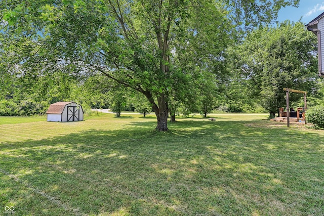 2426 Borgman Ct, Indianapolis, IN 46229 - view of green lawn featuring a storage unit