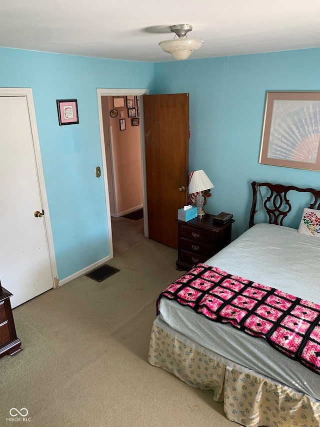 2010 N Winton Ave, Speedway, IN 46224 - bedroom with carpet floors and baseboards