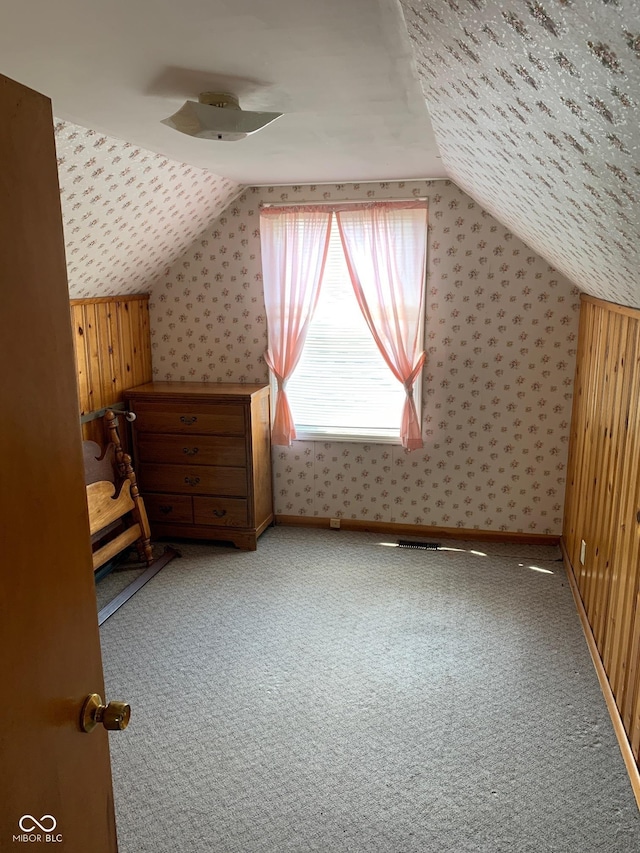 2010 N Winton Ave, Speedway, IN 46224 - bonus room with vaulted ceiling, wallpapered walls, carpet, and ceiling fan
