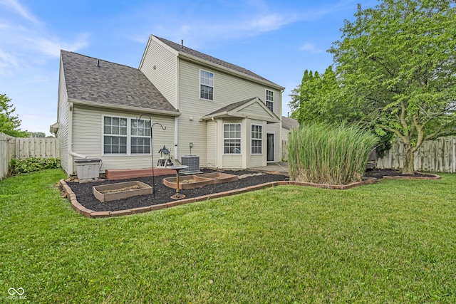 10832 Washington Bay Dr, Fishers, IN 46037 - rear view of house featuring a fenced backyard, a shingled roof, and a patio