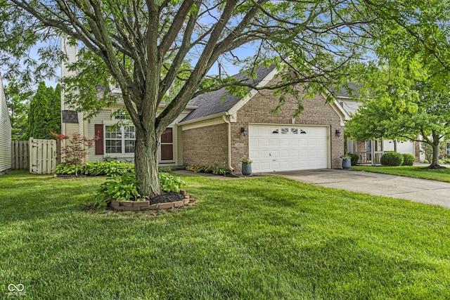 10832 Washington Bay Dr, Fishers, IN 46037 - view of front of house with a garage, brick siding, concrete driveway, and roof with shingles