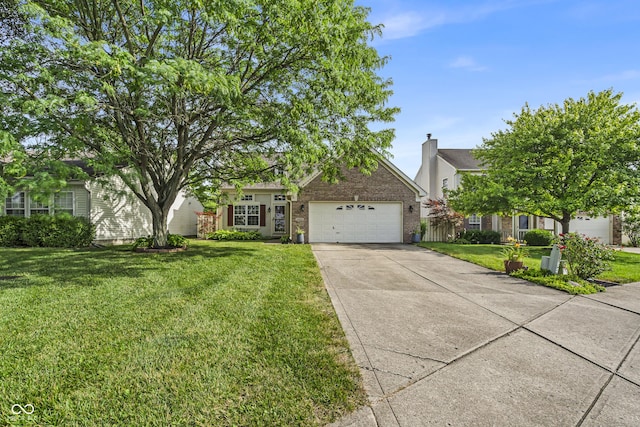 10832 Washington Bay Dr, Fishers, IN 46037 - view of property hidden behind natural elements featuring a garage, driveway, brick siding, and a front yard
