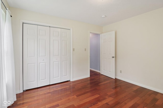 151 S St, Southport, IN 46227 - unfurnished bedroom with wood finished floors and a closet