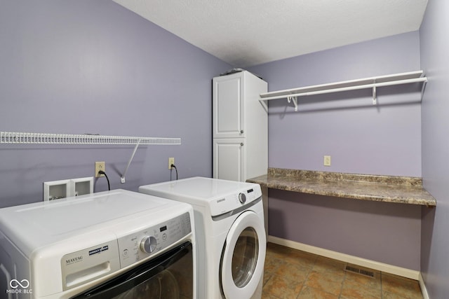 151 S St, Southport, IN 46227 - laundry room featuring washing machine and dryer and cabinet space