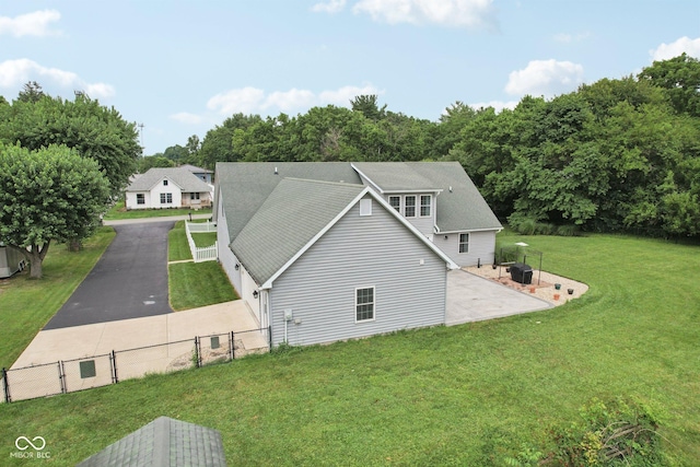 151 S St, Southport, IN 46227 - view of home's exterior with a patio and a gate