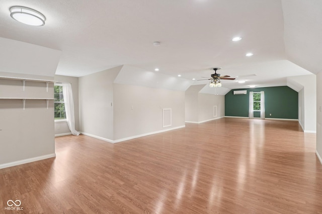 151 S St, Southport, IN 46227 - unfurnished living room featuring lofted ceiling, a ceiling fan, light wood-style floors, and recessed lighting