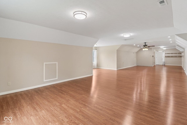 151 S St, Southport, IN 46227 - bonus room with ceiling fan, light wood-style flooring, and vaulted ceiling