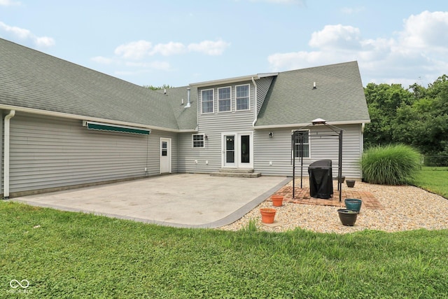 151 S St, Southport, IN 46227 - rear view of property featuring a patio area, a yard, and roof with shingles