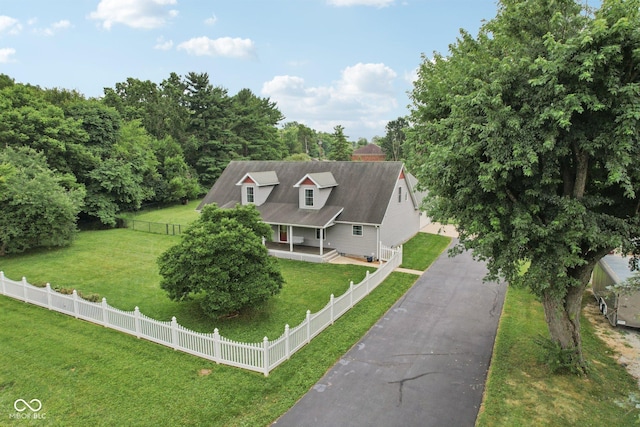 151 S St, Southport, IN 46227 - view of front facade with driveway and a porch