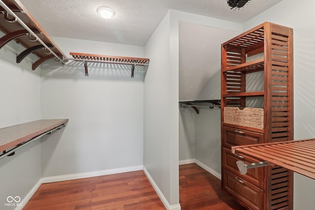 151 S St, Southport, IN 46227 - walk in closet featuring dark wood finished floors