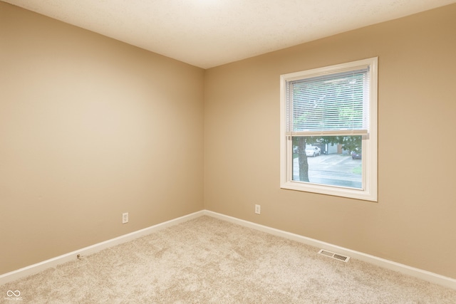 3613 Moller Rd, Indianapolis, IN 46224 - carpeted empty room featuring baseboards