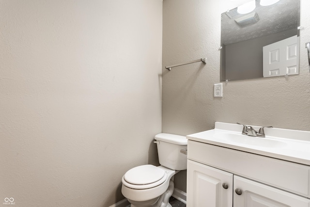 3613 Moller Rd, Indianapolis, IN 46224 - half bathroom featuring vanity and toilet