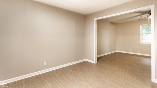 3613 Moller Rd, Indianapolis, IN 46224 - spare room with wood finished floors and ceiling fan