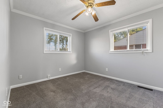 748 Maple Ln, Brownsburg, IN 46112 - empty room featuring plenty of natural light, dark colored carpet, ceiling fan, crown molding, and a textured ceiling