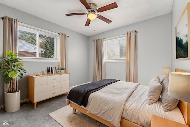 748 Maple Ln, Brownsburg, IN 46112 - bedroom featuring light carpet, multiple windows, and a ceiling fan