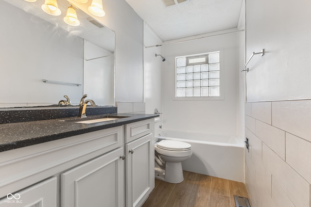 748 Maple Ln, Brownsburg, IN 46112 - full bathroom featuring wood finished floors, vanity, and bathing tub / shower combination